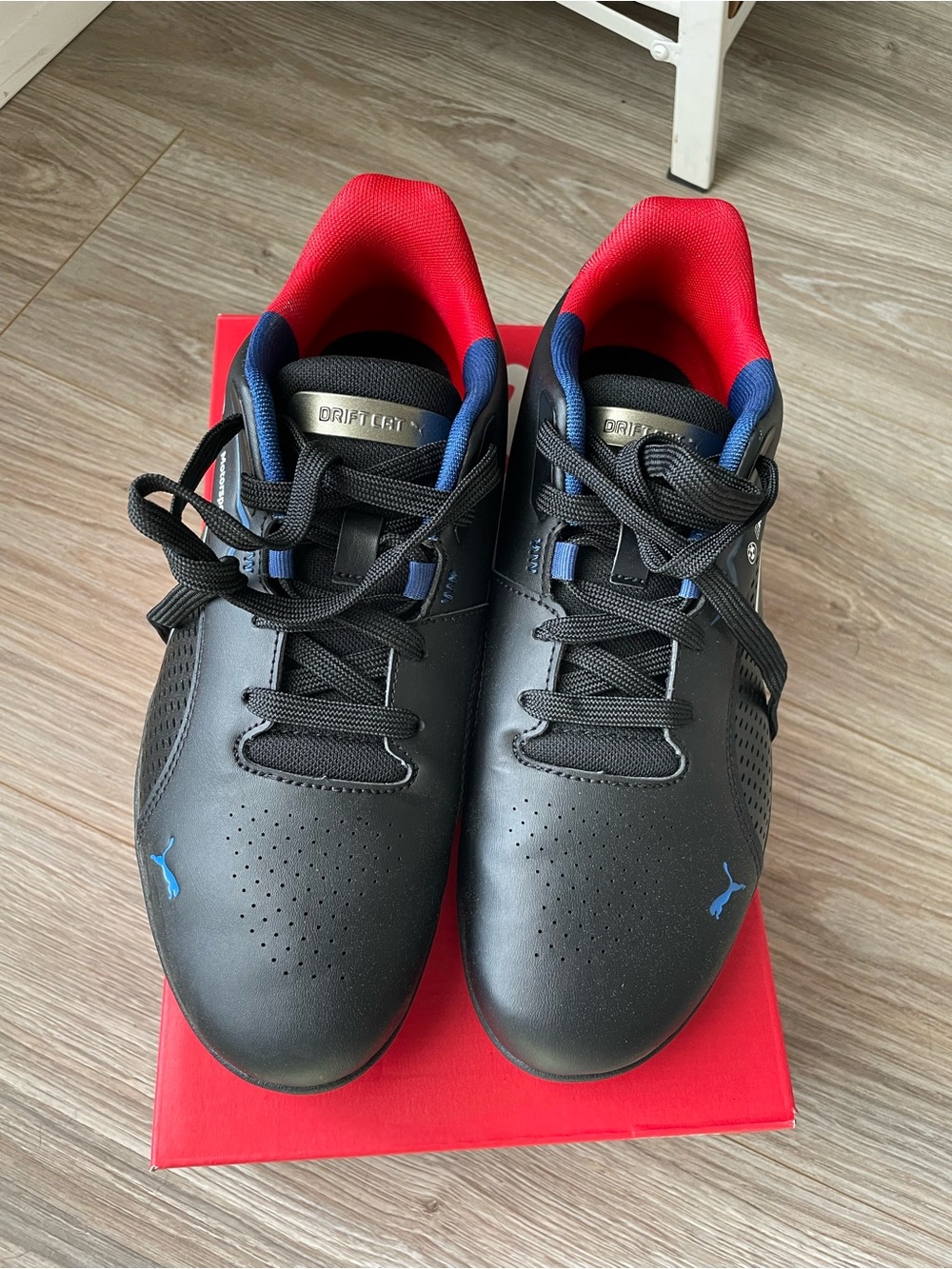 BMW Black Athletic Sneakers with Blue Logos and Red Linings